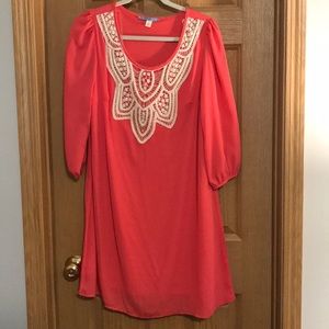 Francesca’s peach dress